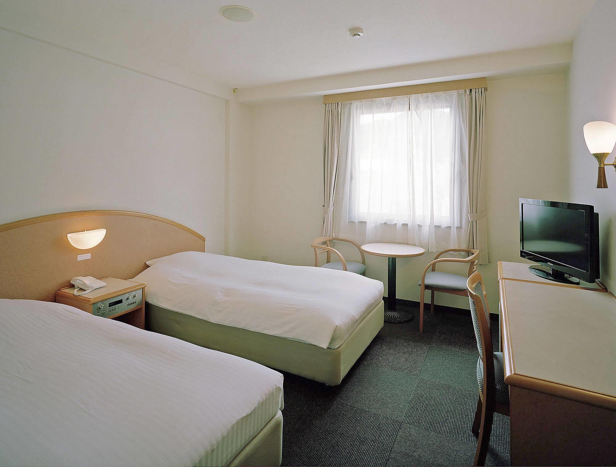 Hotel New Амамі Екстер'єр фото